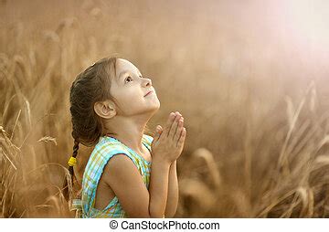 Little girl praying Stock Photo Images. 835 Little girl praying royalty free images and ...