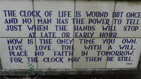 a sign on the side of a building that says, the clock of life is wound but once and no man has ...