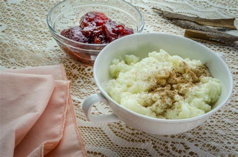 A Dish of Rice Pudding with Jam and Cinnamon. Stock Image - Image of cooked, homemade: 155328109