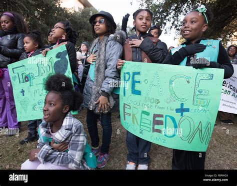 African-American Girl Scouts recite Pledge of Allegiance before Martin ...