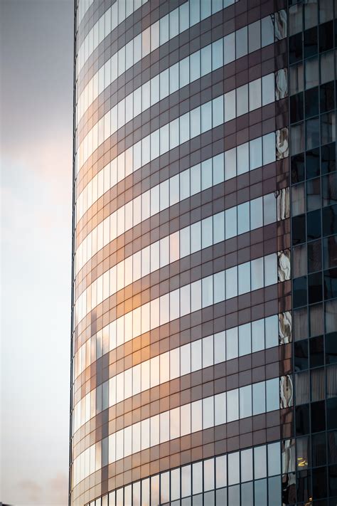 People Cleaning the Windows of a Skyscraper · Free Stock Photo