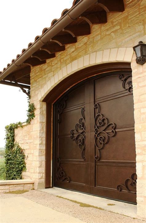 Spanish Style Iron Garage Door | Monarch Custom Doors