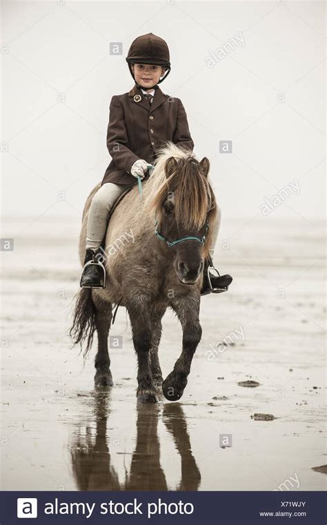 Girls Riding Shetland Pony High Resolution Stock Photography and Images ...