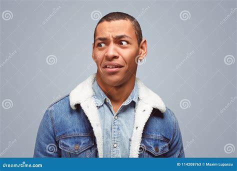 Puzzled Expressive Guy Looking Stock Image - Image of emotion, decision ...