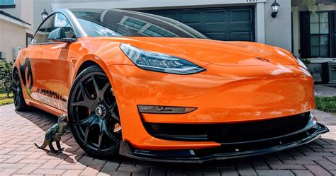 Meet 'Stormbreaker', the orange-wrapped Tesla Model 3 | EVANNEX ...