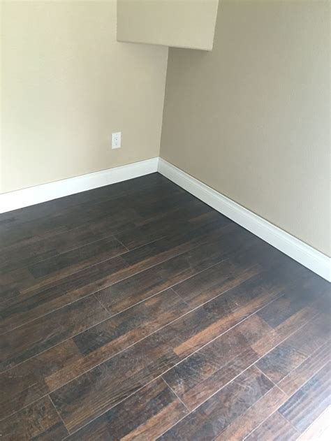 Baseboard install | Baseboards, Hardwood floors, Hardwood