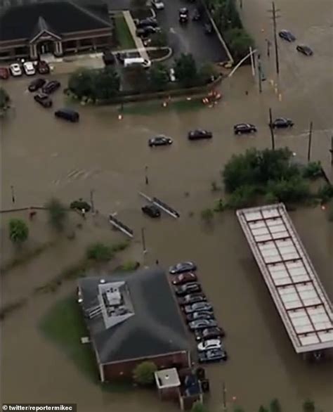 Michigan tornados leaves overturned cars on I-96 near Webberville and Detroit area roads flooded ...