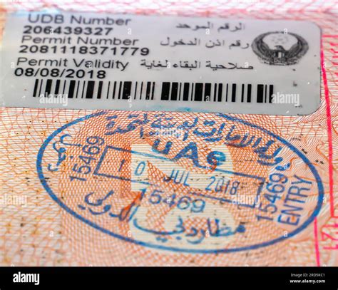 UAE border crossing stamp in an open passport. United Arab Emirates entry passport stamp. Dubai ...