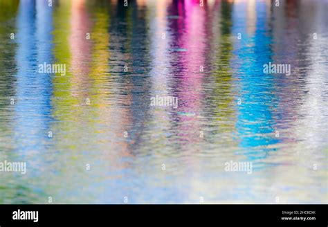 Colourful reflection in water Stock Photo - Alamy