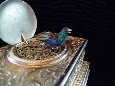 In addition to selling fine singing bird boxes, antique music boxes, vintage watches and other ...