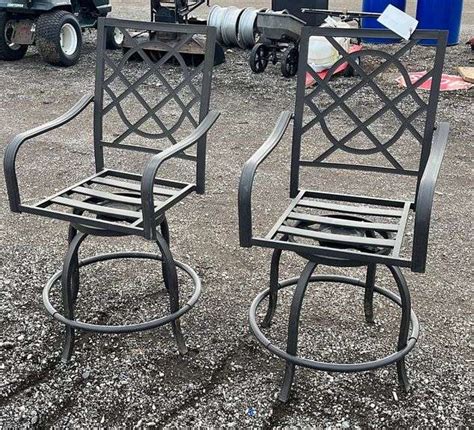 (2) Outdoor metal chairs, swivel seats, good - Albrecht Auction Service