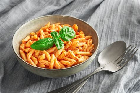 Close Up Cavatelli Pasta in Tomato Sauce on the Tablecloth Stock Photo - Image of fabric, cooked ...