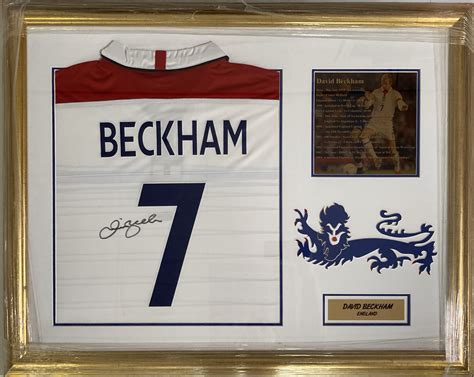 Lot 169 - DAVID BECKHAM SIGNED SHIRT IN FRAMED DISPLAY.