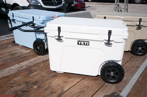 Yeti Coolers with Wheels and Handle Available Now in White, Blue and Tan!