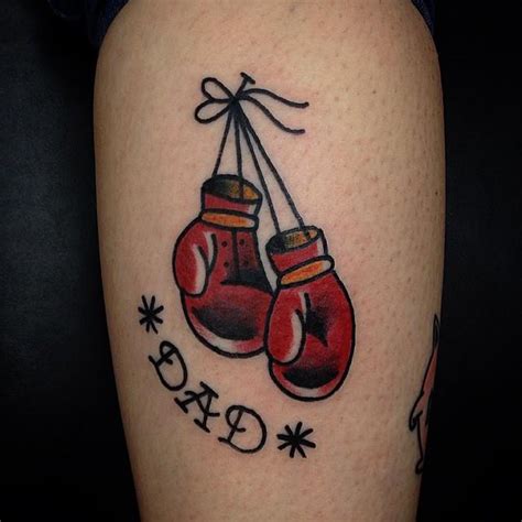 Traditional boxing gloves tattoo by Justin Wayne: TattooNOW