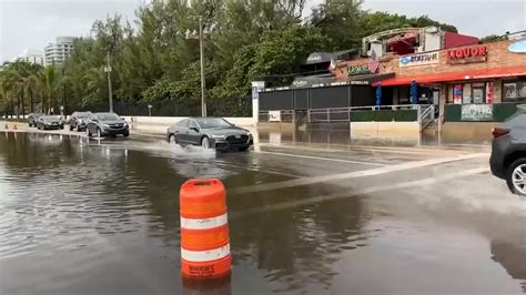 South Florida residents, tourists endure high tides, flooding as ...