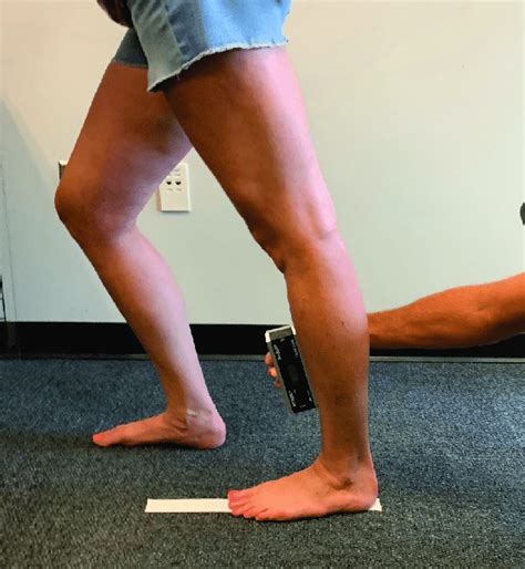 Standing dorsiflexion range of motion measurement. Fig. 3. Kneeling ...