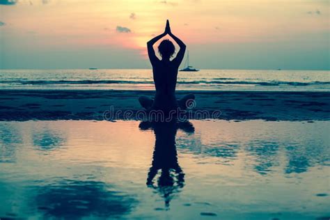 Silhouette Young Woman Practicing Yoga on the Beach Stock Photo - Image of mind, alone: 82217942