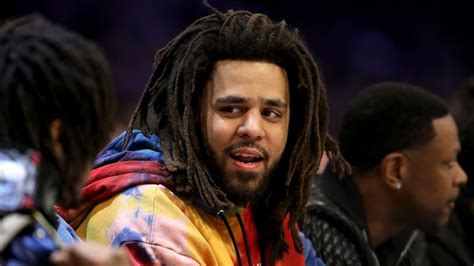 J. Cole: Rapper makes his debut in African basketball league the same weekend his album drops | CNN