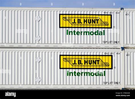 Everett, WA, USA - November 11, 2023; Pair of J B Hunt intermodal containers stacked in closeup ...