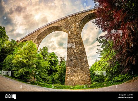 Old railway arch bridge in Germany Stock Photo - Alamy