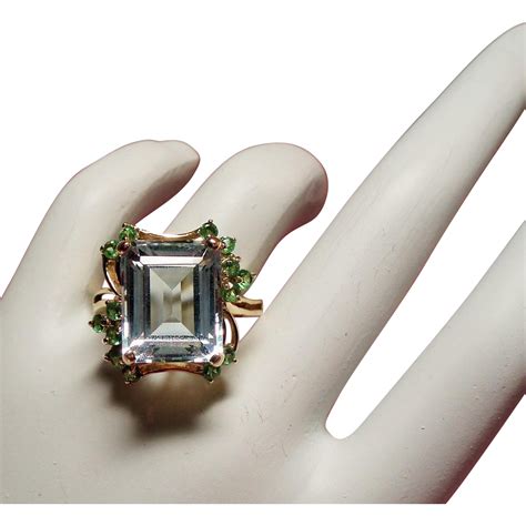 Vintage Icy Emerald Cut Aquamarine and Peridot 14K Ring from unforgettable on Ruby Lane