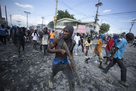 Calls for help, humanitarian corridor as gangs siege Haiti | AP News