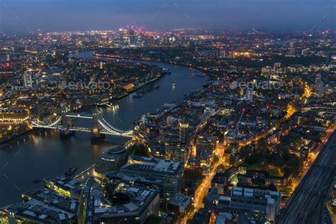 Aerial view of river Thames in London at night Stock Photo by mkos83