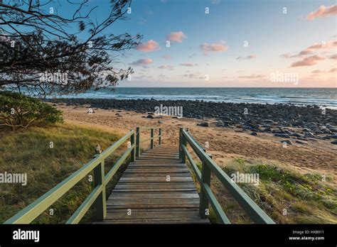 View down path to Mon Repos beach at dawn. Bundaberg, Queensland, Australia Stock Photo - Alamy