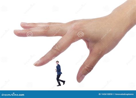 Tiny Man Trapped and Being Held by Giant Female Hands Stock Photo ...