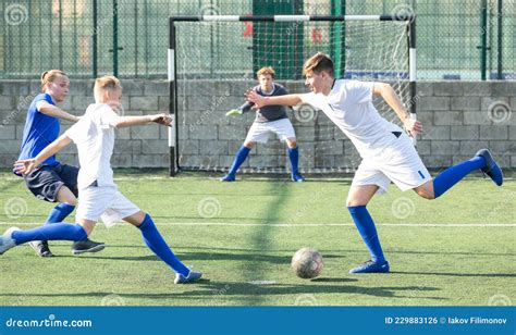 Teens Playing Soccer Football Match. Competition between Two Youth ...