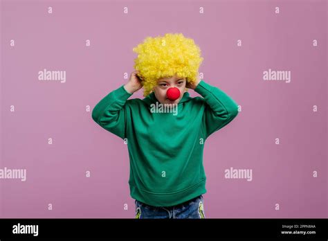 Portrait of little boy with down syndrome, in carnival costume Stock Photo - Alamy