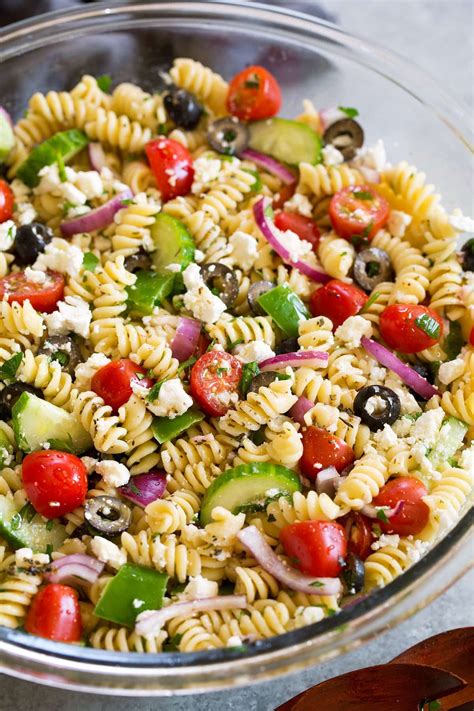 This Greek Pasta Salad is a must have side dish recipe! It's so bright and refreshing, it's ...