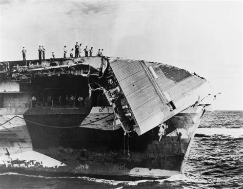 Essex-class aircraft carrier USS Hornet (CV-12), with a fractured flight deck courtesy of the ...