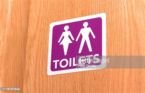 Gender Neutral Toilet Door Sign High-Res Stock Photo - Getty Images
