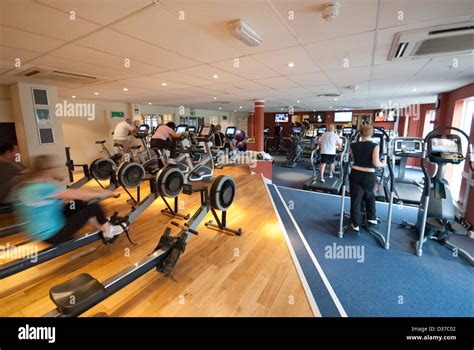 Hotel gym with customers using the equipment Stock Photo - Alamy