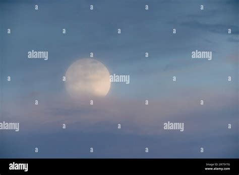 Moon, full moon, evening sky, clouds Stock Photo - Alamy