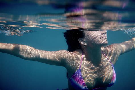 Woman Swimming Underwater Photograph by Ubald Rutar - Fine Art America