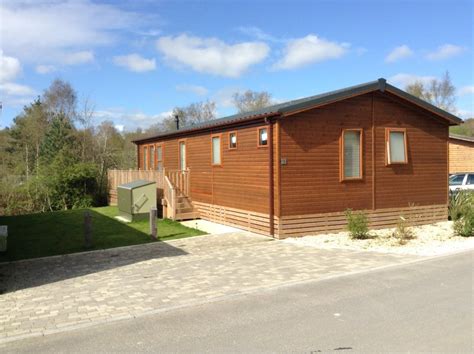 Luxury 3 bed lodge in a woodland setting, sleeps 6, Warmwell holiday ...