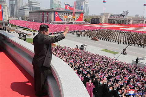 North Korea's Kim Jong Un oversees parade to honor grandfather