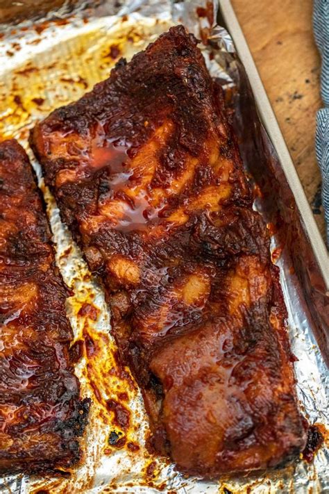 Tender Oven Baked BBQ Ribs That Fall Off the Bone | Recipe | Baked ribs, Baked pork ribs, Rib ...