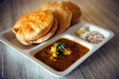 Puri bhaji, close up. Poori masala, fried indian bread. South Indian ...