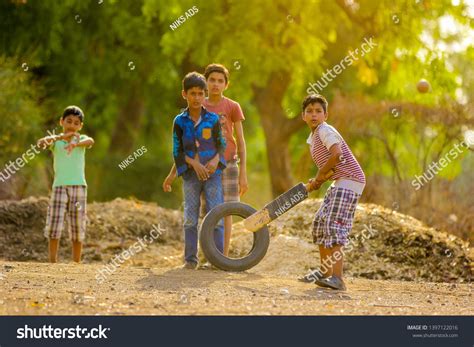 657 Indian child playing cricket Images, Stock Photos & Vectors ...