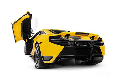 McLaren 12C supercar front open butterfly door Photograph by Maxim Images Prints