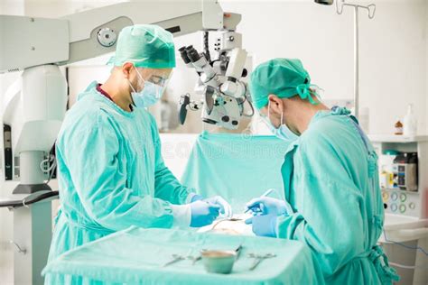 Two Doctors during Surgery at a Hospital Stock Photo - Image of health, environment: 82300638