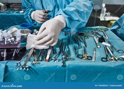 Close-up Of Surgeons Holding Surgical Knife And Forceps In Operating ...