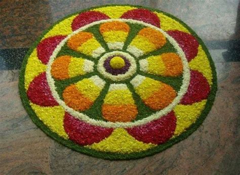 Flower rangoli | Pookalam design, Rangoli designs images, Rangoli designs