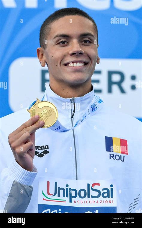 David Popovici of Romania shows the medal after compete in the 100m freestyle Men Final during ...