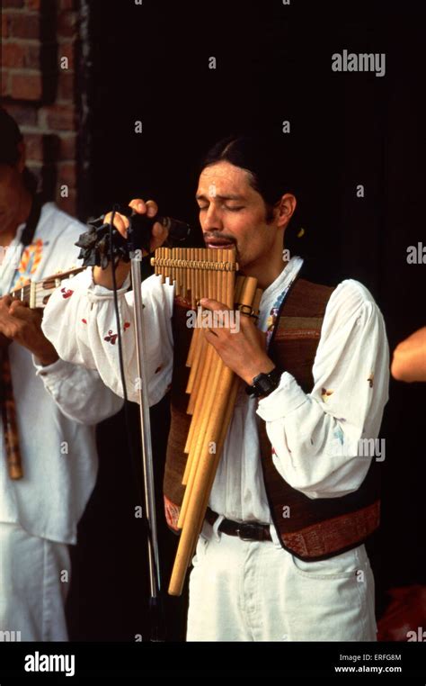 South America musician playing PAN PIPES, (Andean Pipes) Microphone Stock Photo - Alamy