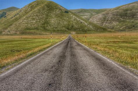 Premium Photo | Road leading towards mountains